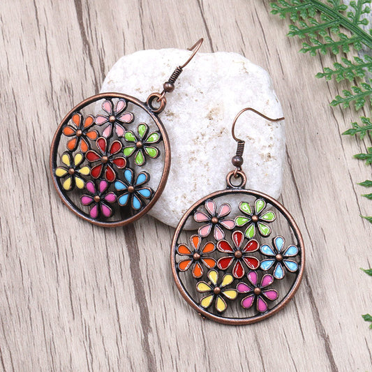 Pendientes de flores con recorte redondo a la moda