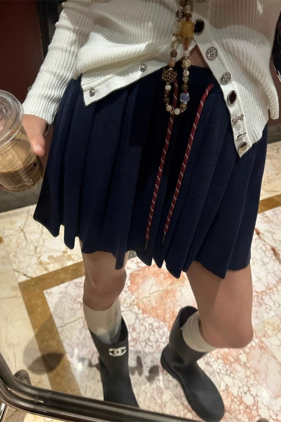 Pleated Knit Mini Skirt