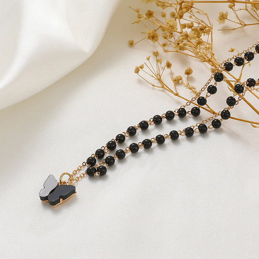 Elegantes collares de mariposa geométrica