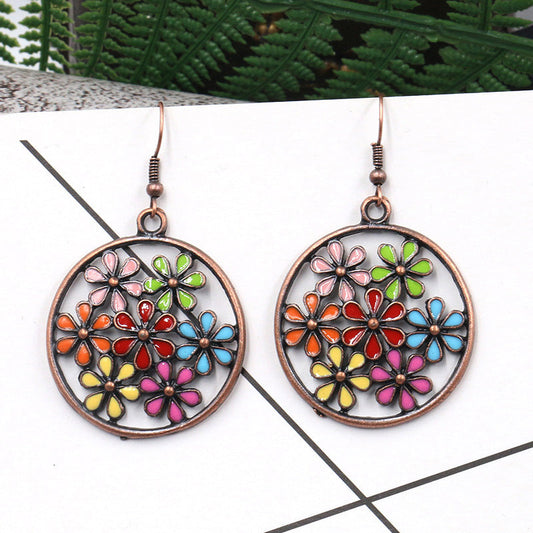Pendientes de flores con recorte redondo a la moda