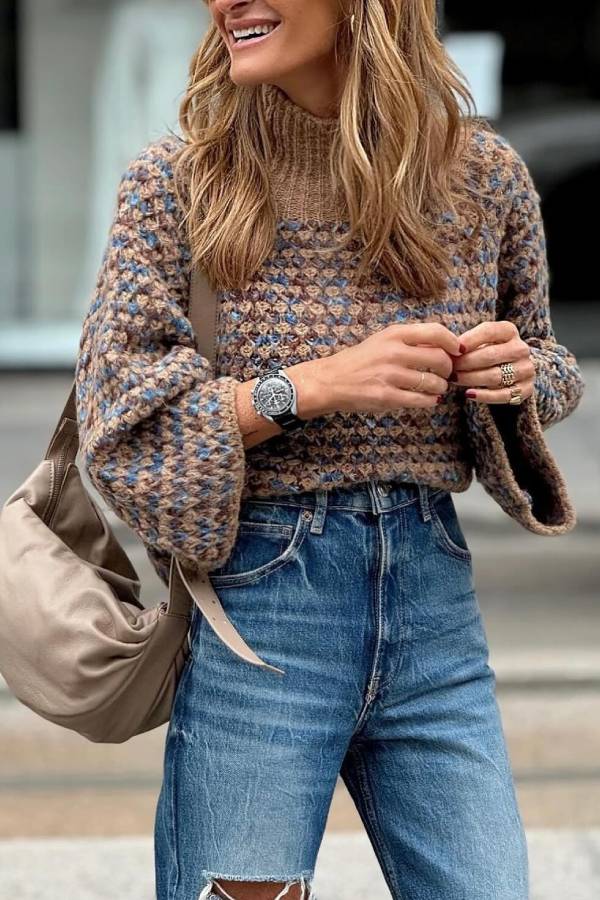 Brown and blue heathered chunky knitted turtleneck and flared sleeve sweater