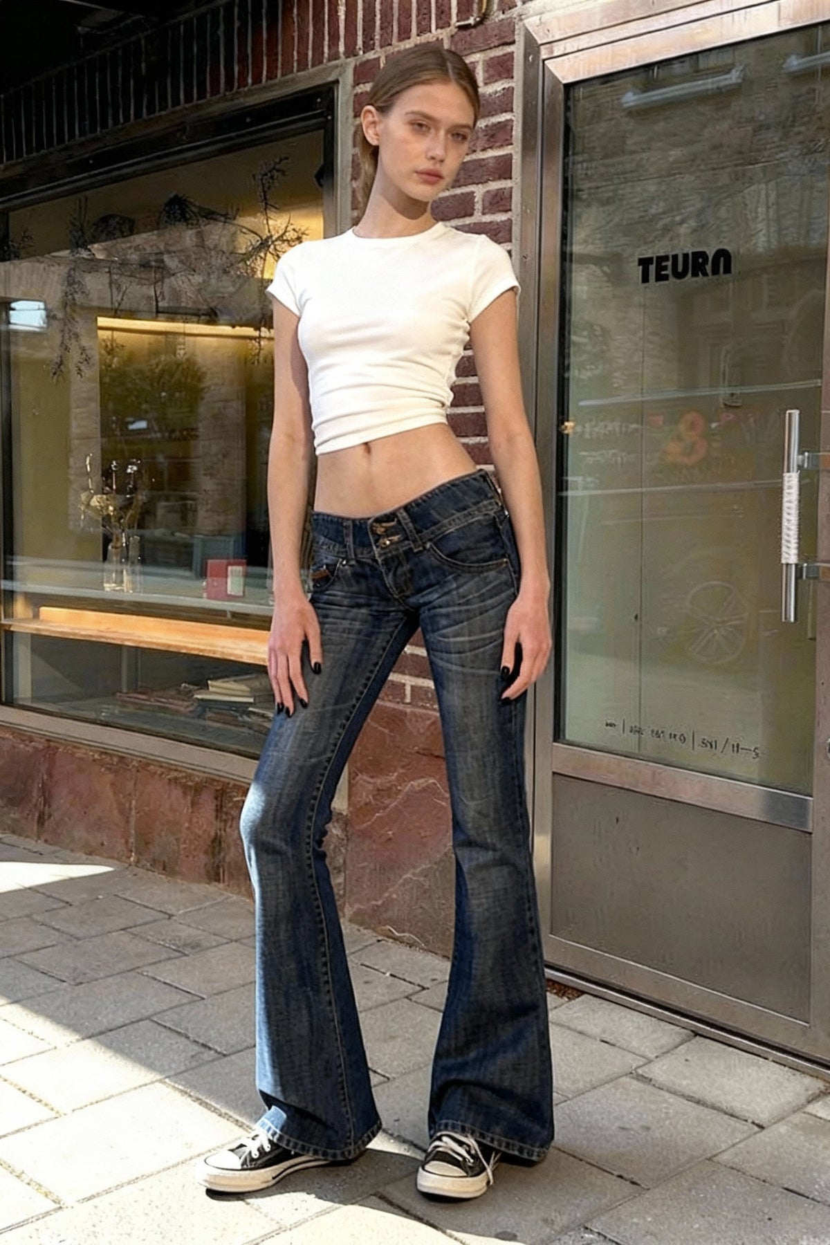 Low Waisted Washed Slim Flared Leg Jeans