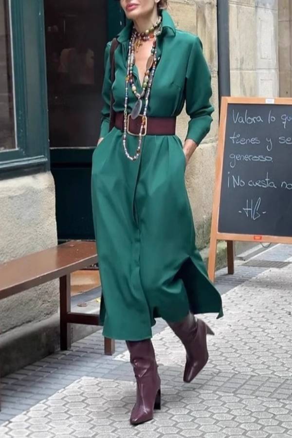 Satin shirt dress with a fitted waist and side slit.