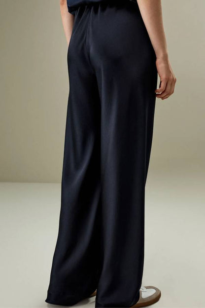 Bias-cut satin trousers