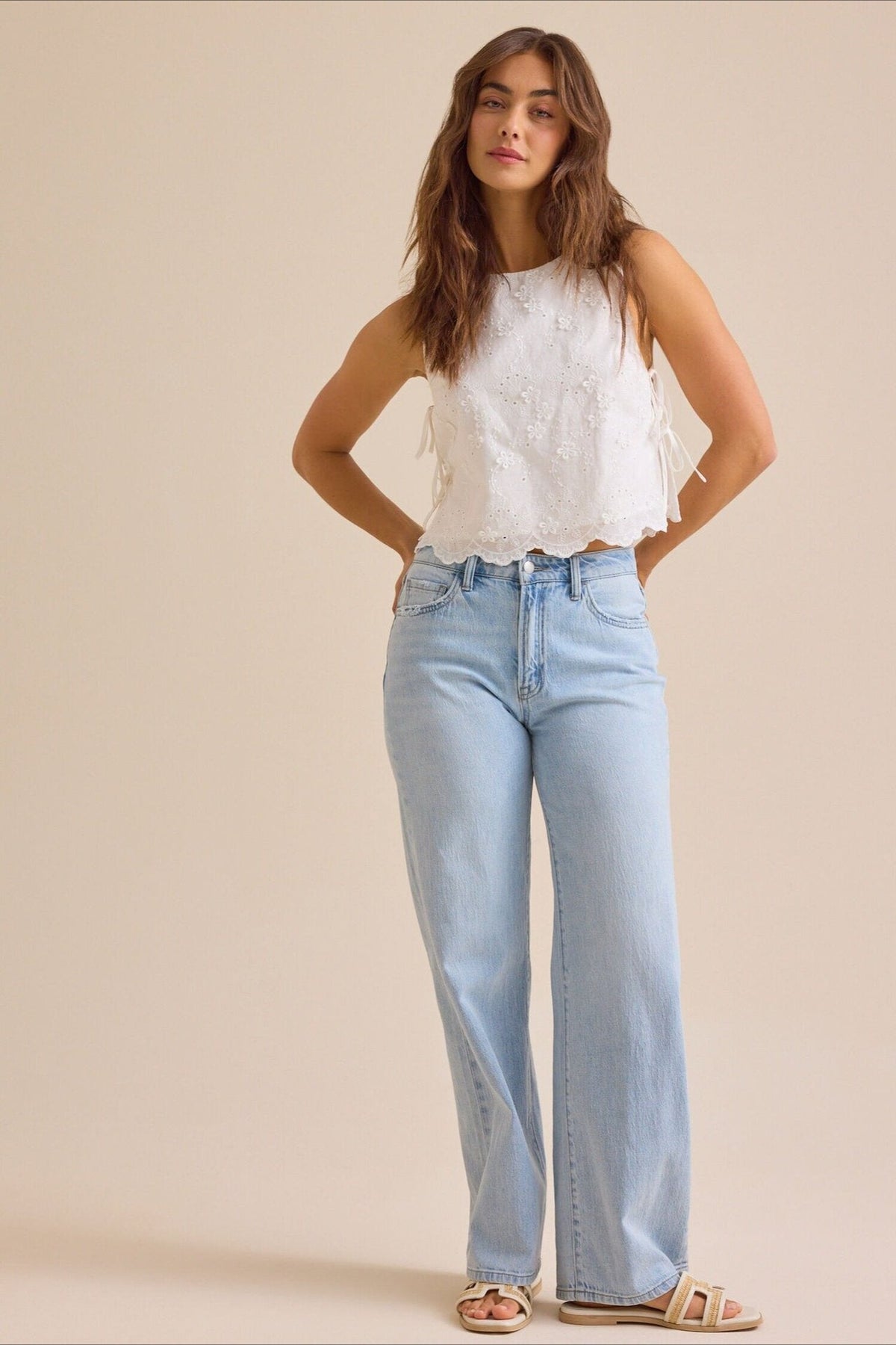 Solid Embroidered Sleeveless Round Neck Crop Top