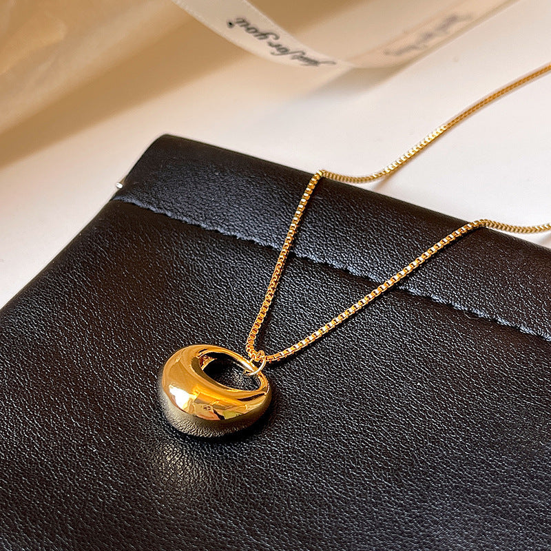 Long Gold Circle And Teardrop Pendant Necklace