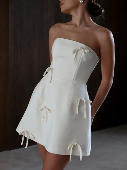 Strapless Princess Seam Bow Detail Structured Mini Dress