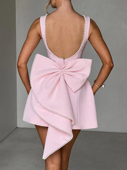 Sleeveless Pearl Trim Bow Back Cascading Ruffle A-Line Mini Dress