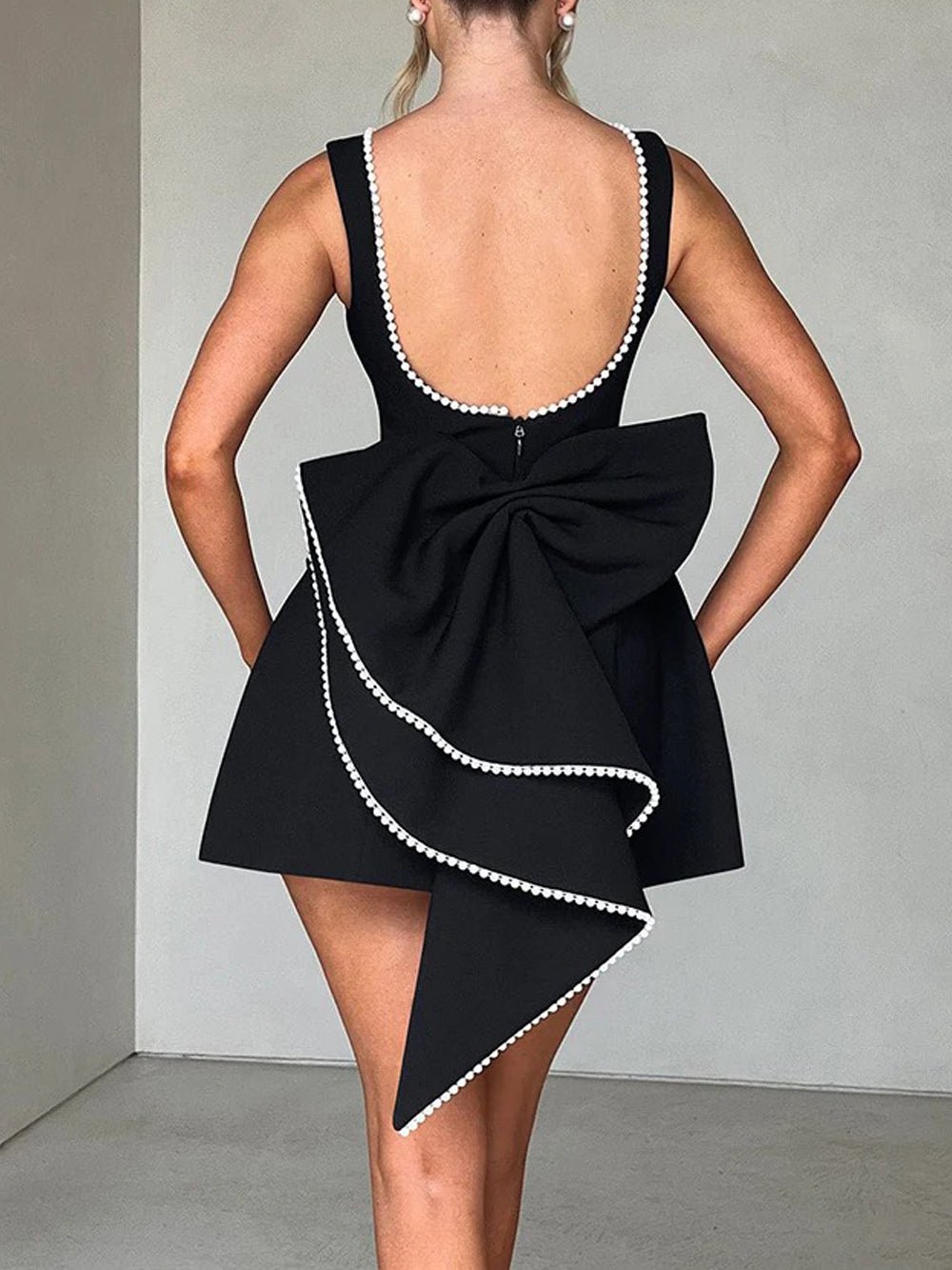 Sleeveless Pearl Trim Bow Back Cascading Ruffle A-Line Mini Dress