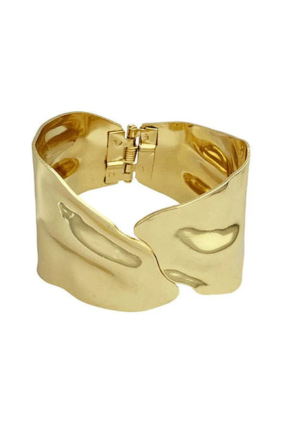 A Stylish and Distinctive Open-style Bracelet Featuring An Irregular, Crisscross Design.
