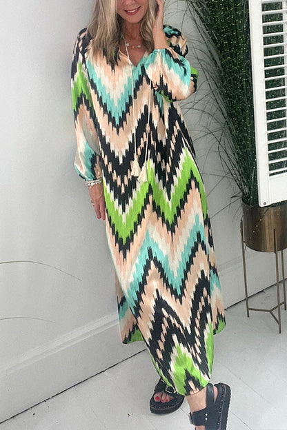 GROOVY Fashion striped v-neck puff sleeve fringed dress