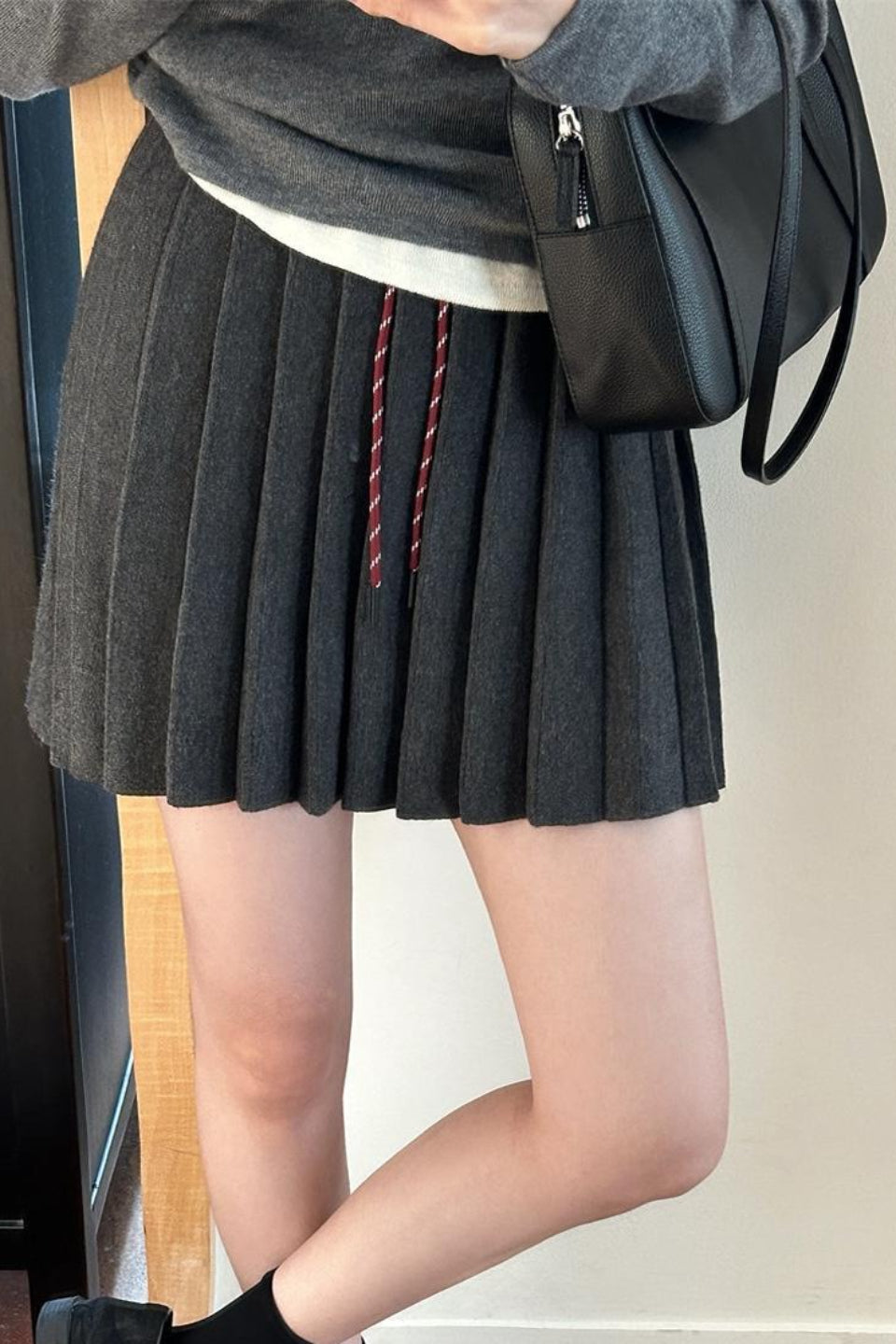 Pleated Knit Mini Skirt