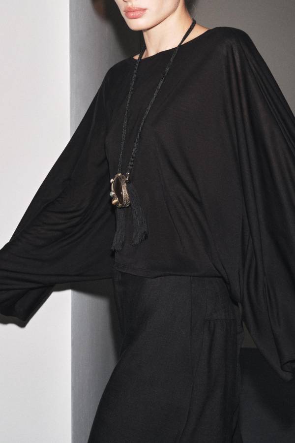 ASYMMETRIC FLOWING CAPE