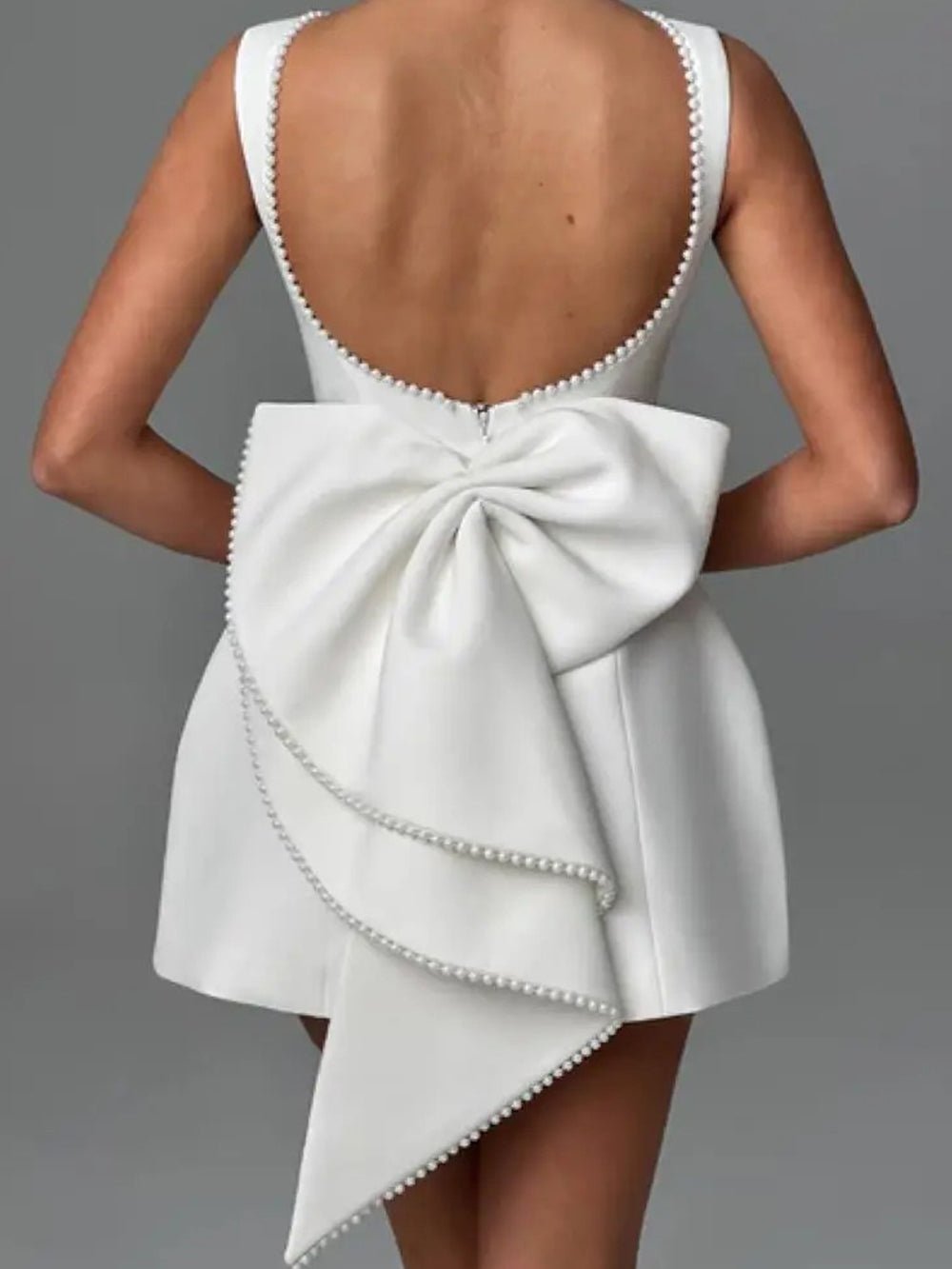 Pearl Trim Boat Neck Bow Back Pocket Skater Mini Dress
