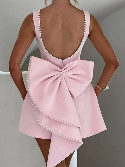 Pearl Trim Boat Neck Bow Back Pocket Skater Mini Dress