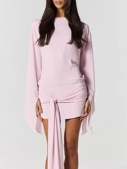 Pink Boat Neck Long Sleeve Flared Slit Cuff Knot Front Draped Sash Open Back Bodycon Mini Dress